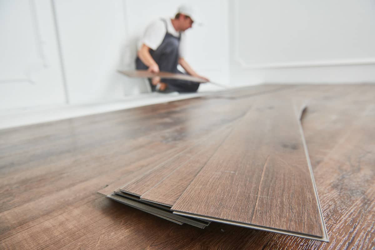 vinyl plank flooring being installed